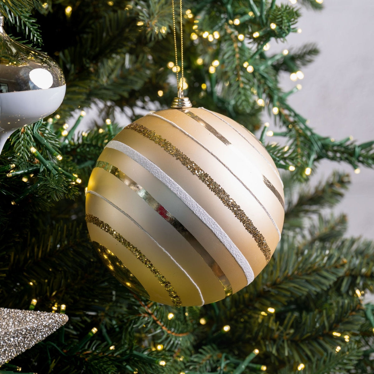 Champagne Swirl Ornament With White & Glitter Details
