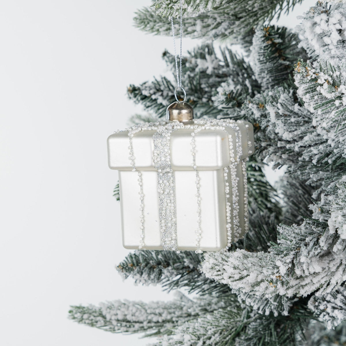 Silver Christmas Box Ornament with Shimmering Tassel