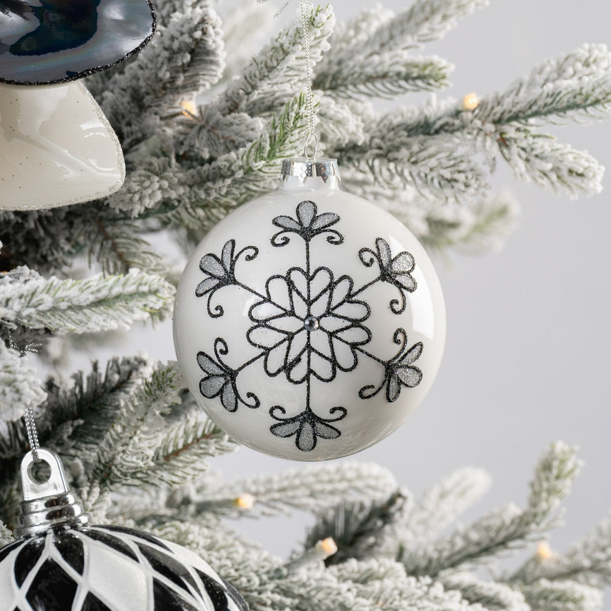 White Ball Ornament with Black Glitter Floral Detail